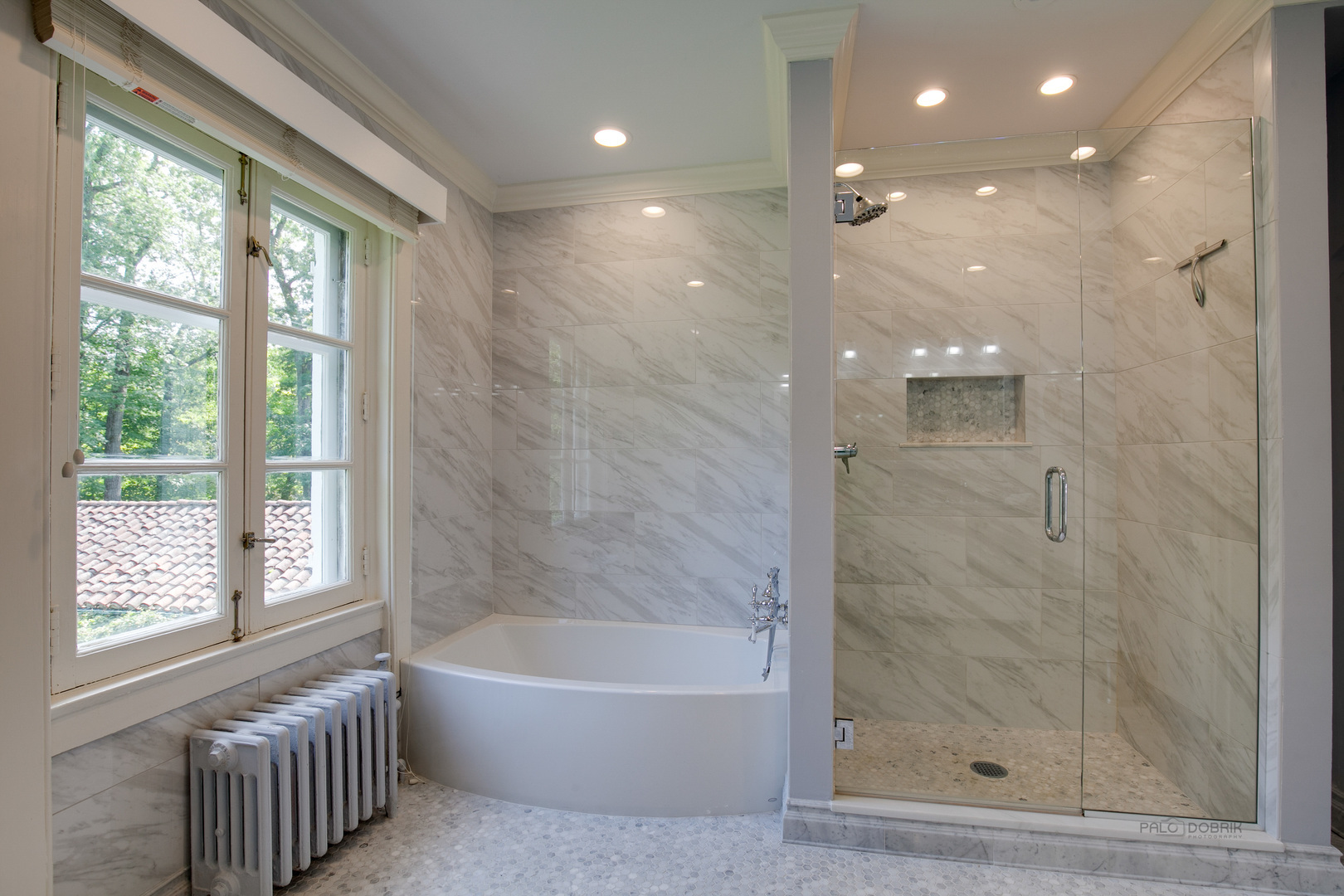 51 South Mayflower Road Lake Forest, IL 60045 - Photo 39 of 85 a bathroom with a bathtub and a shower