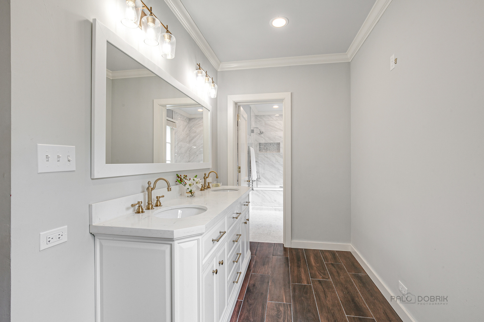 51 South Mayflower Road Lake Forest, IL 60045 - Photo 46 of 85 a bathroom with a sink a mirror and a shower