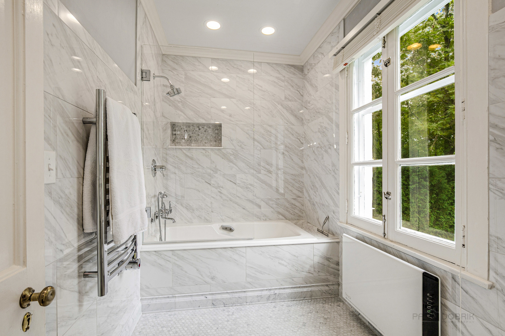 51 South Mayflower Road Lake Forest, IL 60045 - Photo 49 of 85 a bathroom with a bathtub and a shower