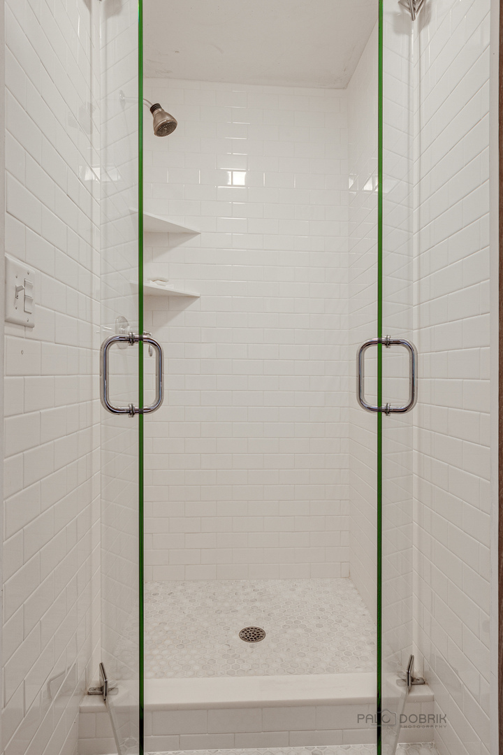 51 South Mayflower Road Lake Forest, IL 60045 - Photo 53 of 85 a bathroom with a shower