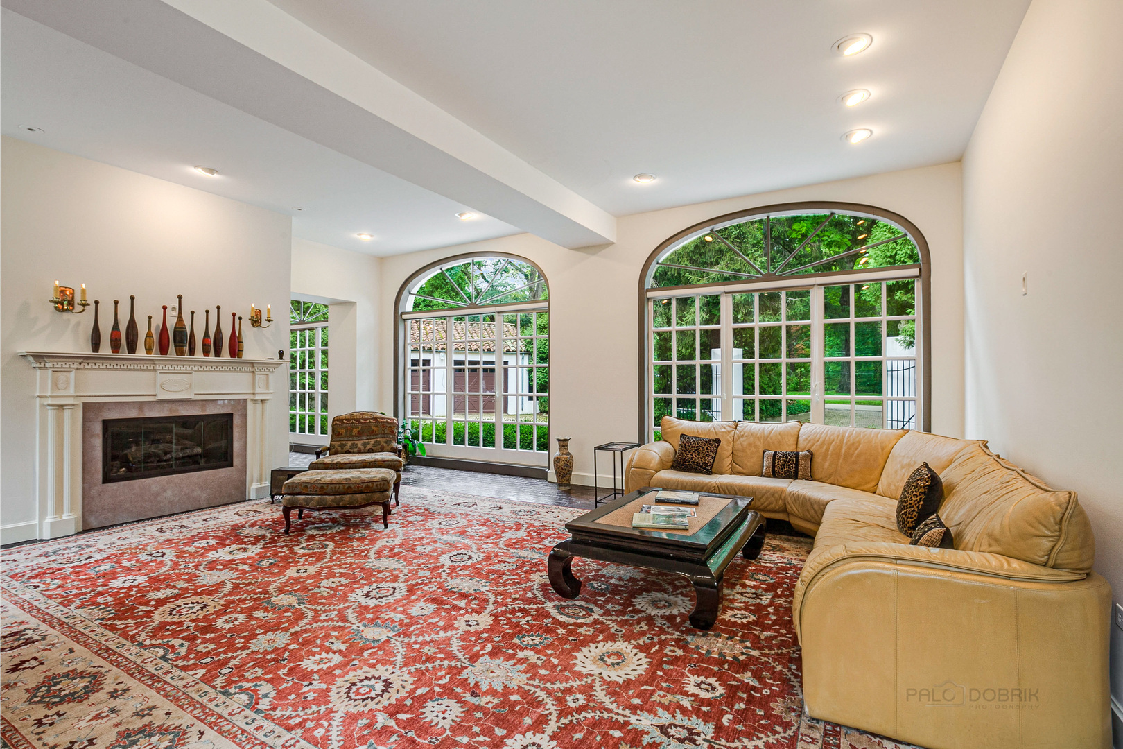 51 South Mayflower Road Lake Forest, IL 60045 - Photo 8 of 85 a living room with furniture and a fireplace