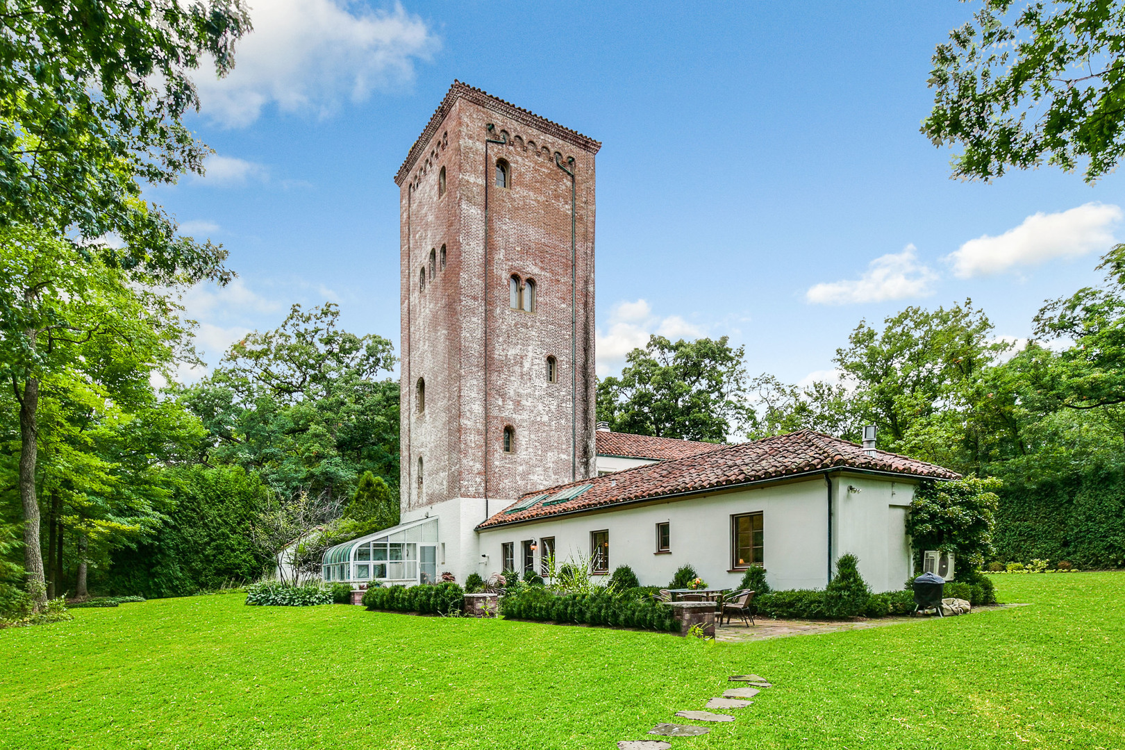 51 South Mayflower Road Lake Forest, IL 60045 - Photo 74 of 85 a view of an house with backyard space and garden