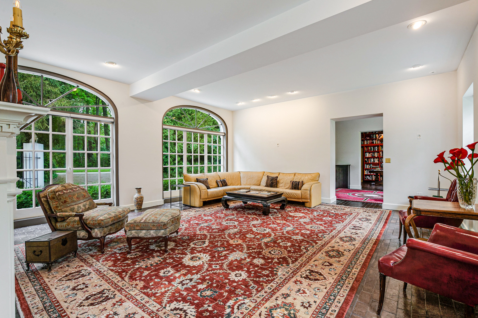 51 South Mayflower Road Lake Forest, IL 60045 - Photo 9 of 85 a living room with furniture fireplace and large windows