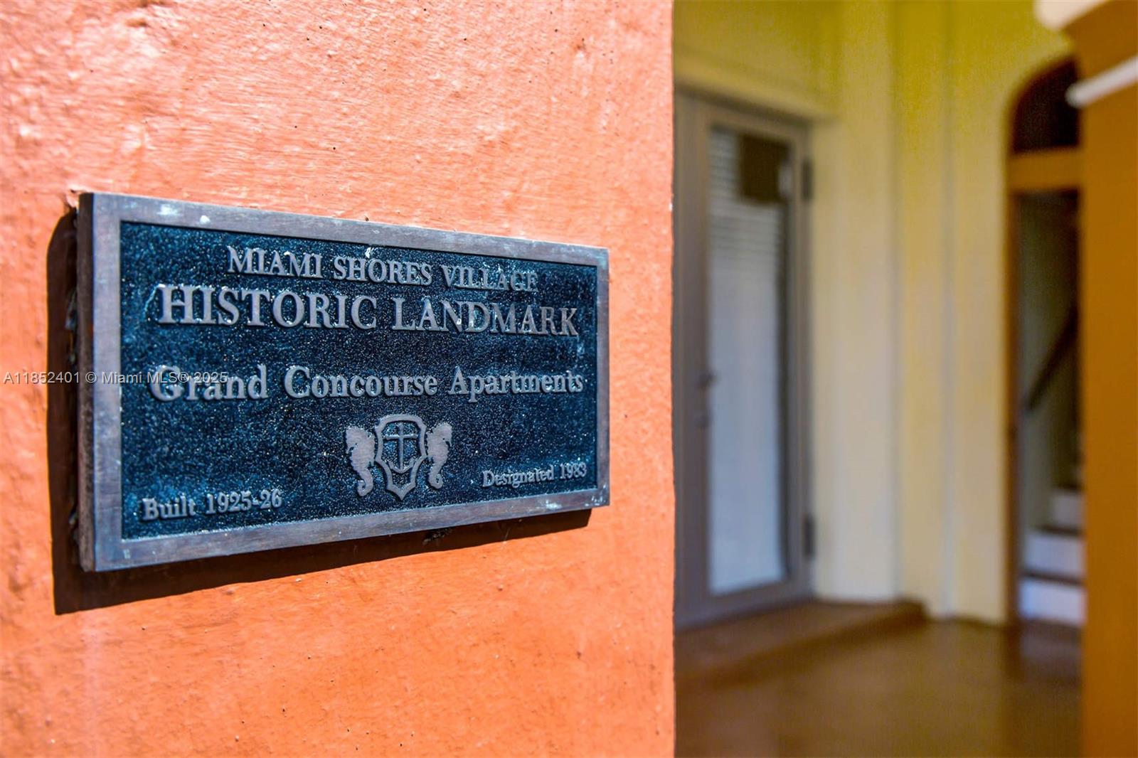 421 Grand Concourse, Unit 6 Miami Shores, FL 33138 - Photo 5 of 8 a sign on the side of a building