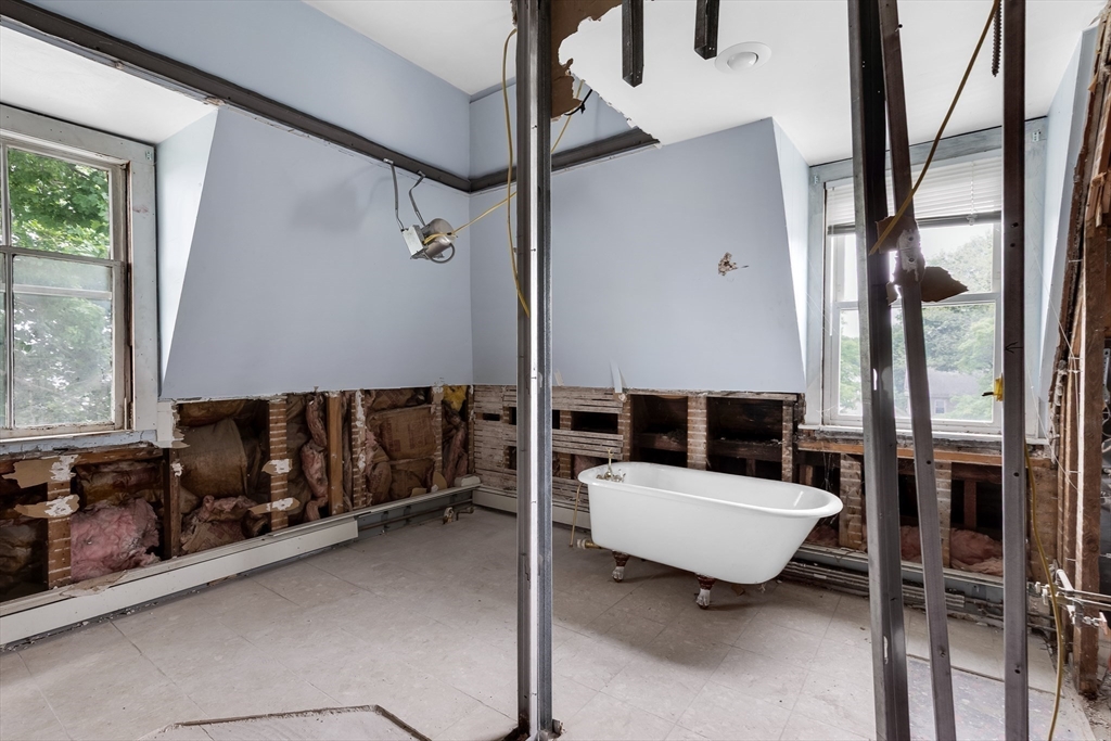 34 Warren Street, Unit 3 Stoneham, MA 02180 - Photo 22 of 34 a living room with furniture