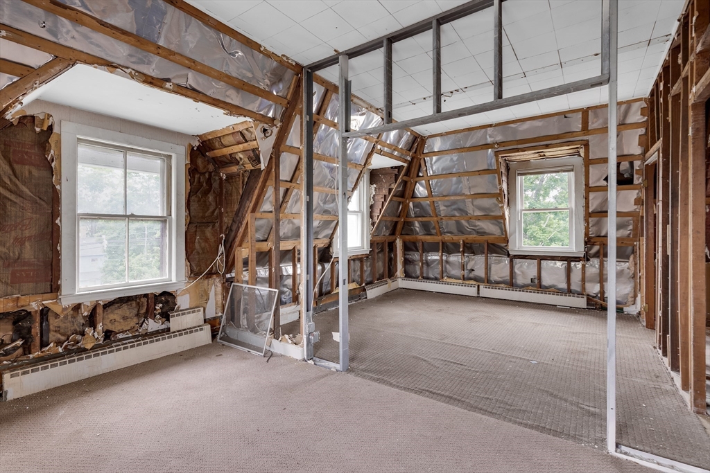 34 Warren Street, Unit 3 Stoneham, MA 02180 - Photo 25 of 34 a view of an empty room with a window
