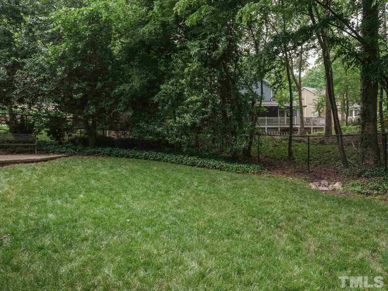 7405 Glendower Road Raleigh, NC 27613 - Photo 24 of 25 a view of a backyard