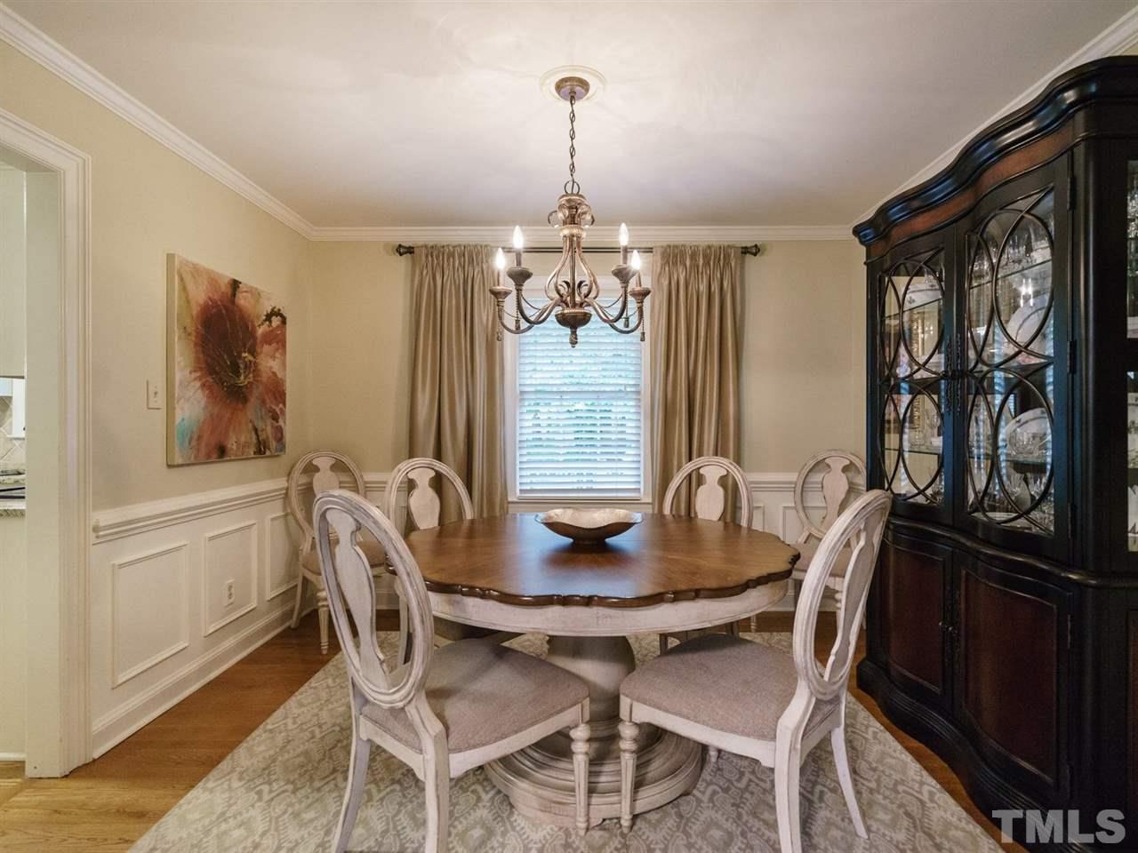 7405 Glendower Road Raleigh, NC 27613 - Photo 7 of 25 a dining room with furniture and window
