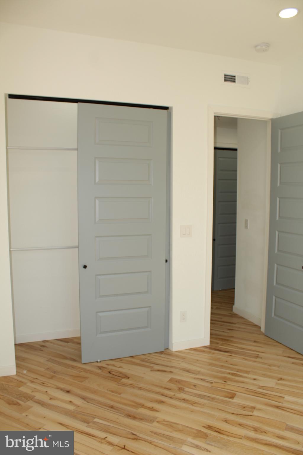3017 Ridge Avenue, Unit B Philadelphia, PA 19121 - Photo 15 of 29 Modern minimalist room with sliding doors.