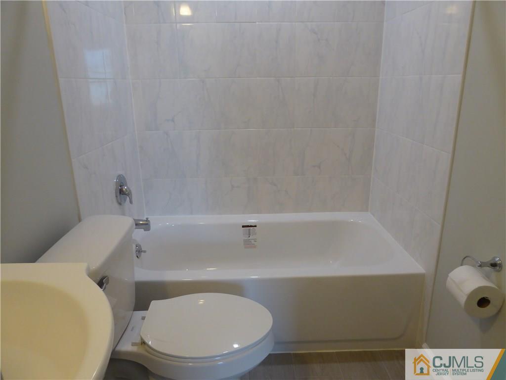 38 Stony Road West Edison, NJ 08817 - Photo 21 of 42 a bathroom with a sink and a toilet