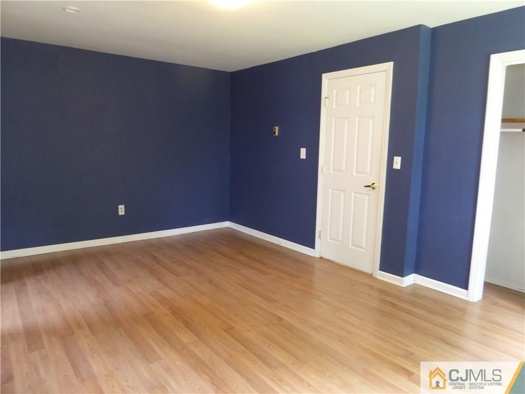 38 Stony Road West Edison, NJ 08817 - Photo 23 of 42 a view of empty room with wooden floor