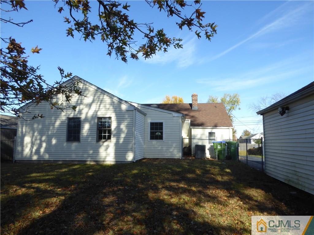 38 Stony Road West Edison, NJ 08817 - Photo 32 of 42 a front view of a house with a yard