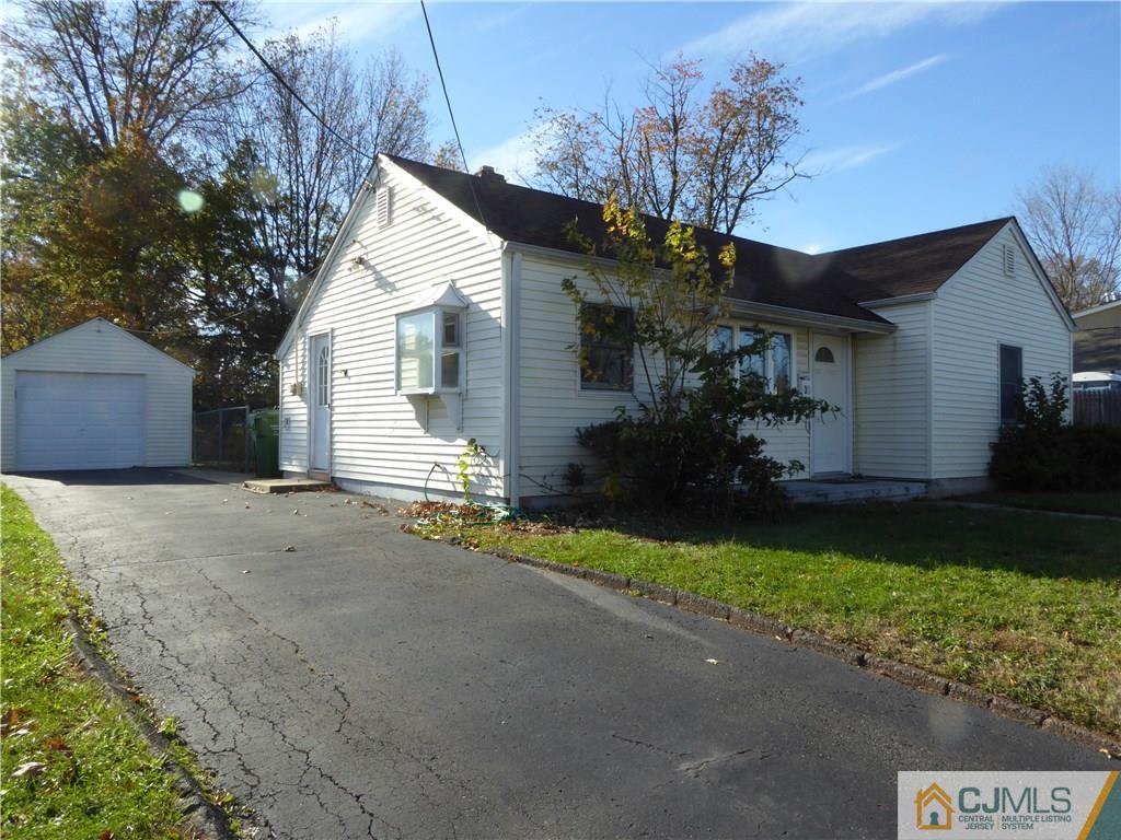38 Stony Road West Edison, NJ 08817 - Photo 36 of 42 a front view of house with yard and green space