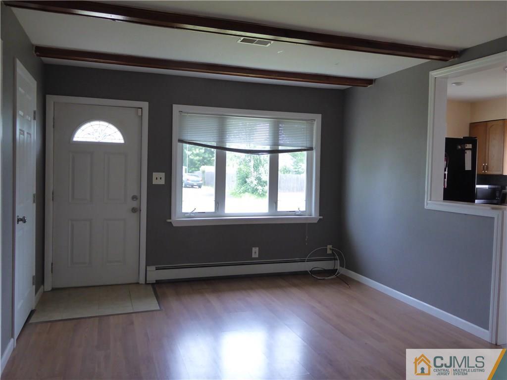38 Stony Road West Edison, NJ 08817 - Photo 10 of 42 a view of room with window and hardwood floor