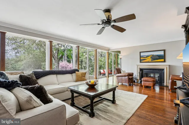 a bathroom with a toilet a sink and a mirror