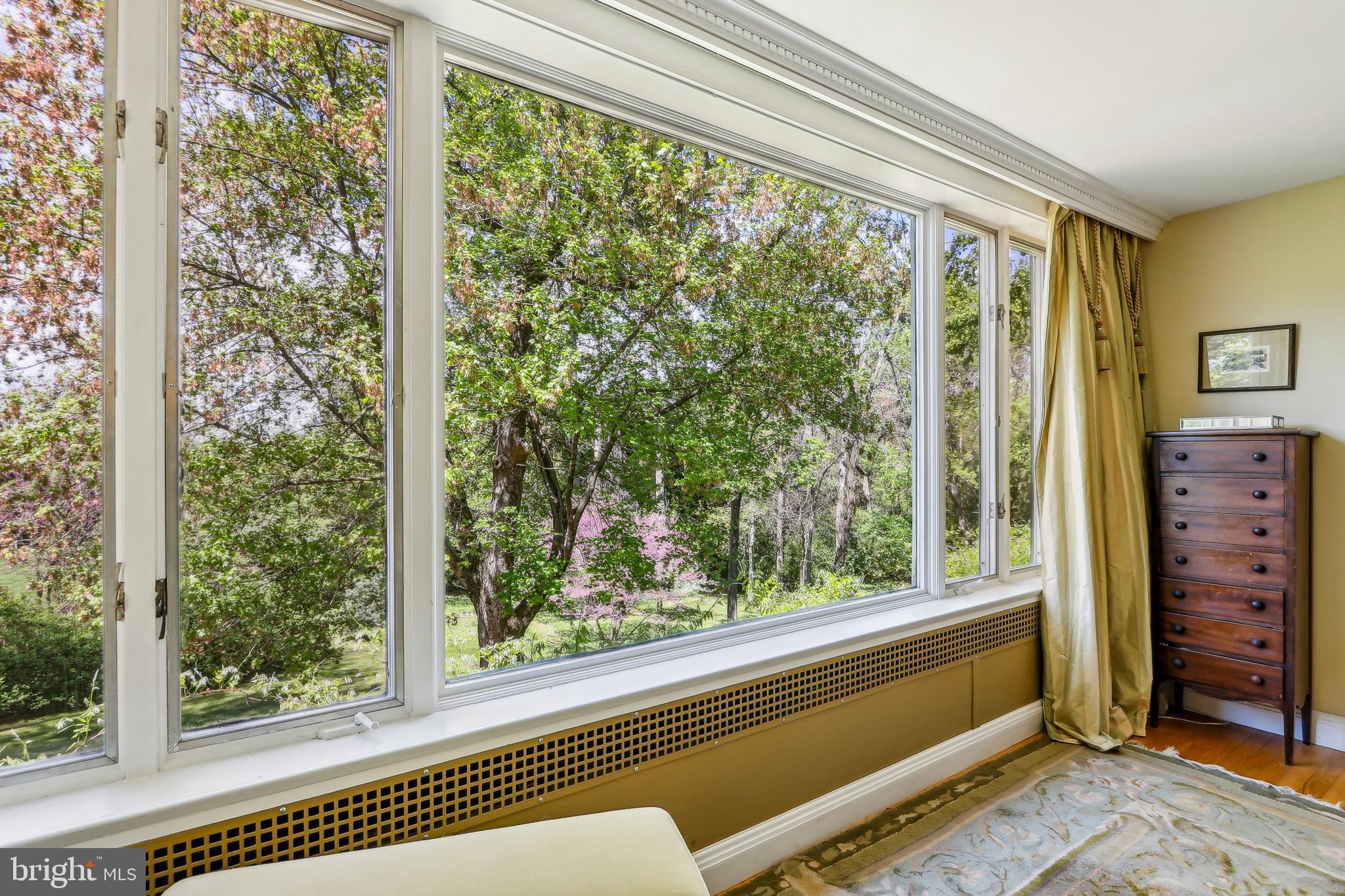 33 Rosedale Road Princeton, NJ 08540 - Photo 50 of 75 a view of a room that has a large window and a bed