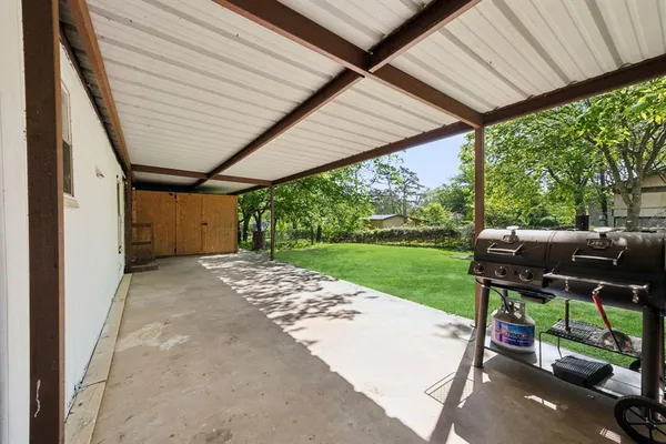 a garden view with a seating space