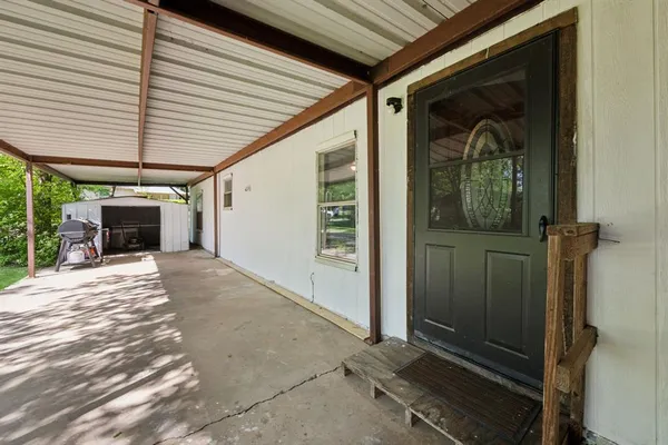 a view of a entryway door of the house