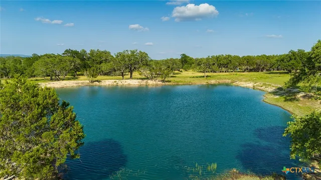 a view of a lake with mountains in the background