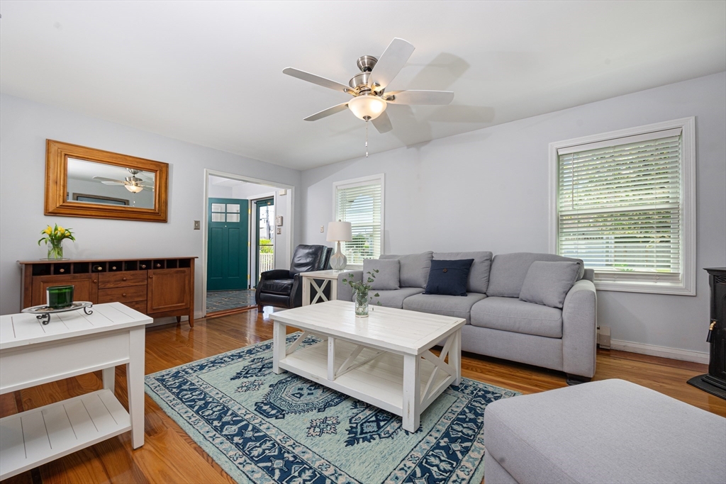 59 J Street Hull, MA 02045 - Photo 11 of 35 a living room with furniture and a table