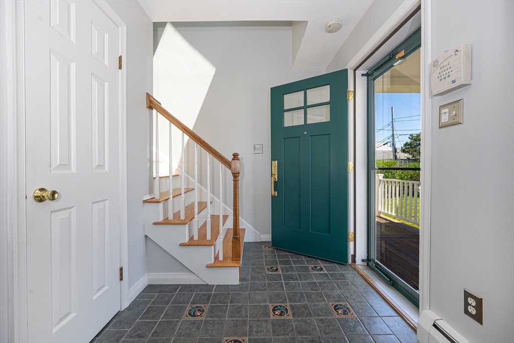 59 J Street Hull, MA 02045 - Photo 9 of 35 a view of an entryway with staircase