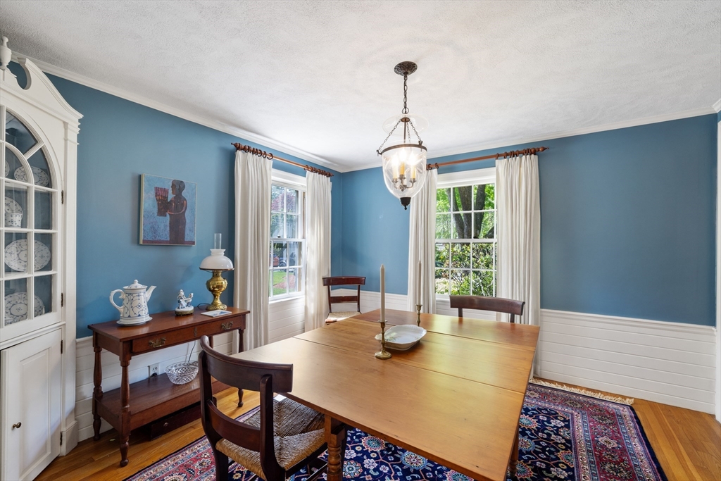 4 Longfellow Road Lexington, MA 02420 - Photo 13 of 37 a view of a dining room with furniture window and wooden floor