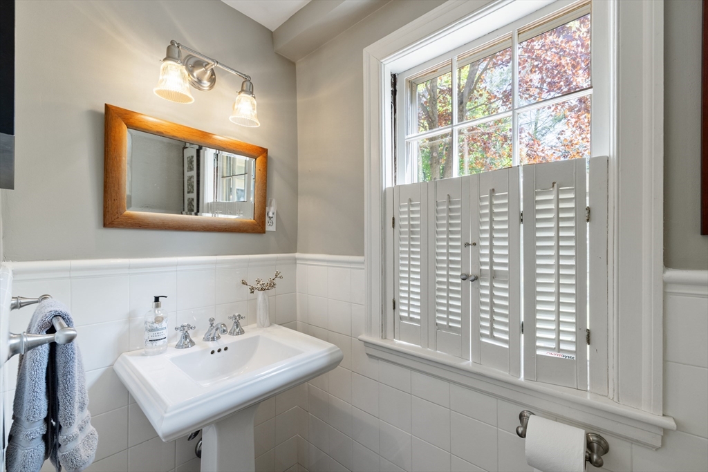 4 Longfellow Road Lexington, MA 02420 - Photo 30 of 37 a bathroom with a sink and a mirror