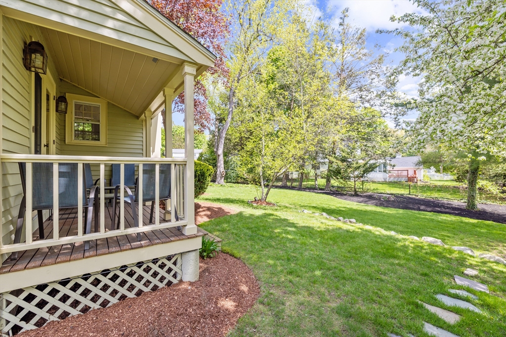 4 Longfellow Road Lexington, MA 02420 - Photo 36 of 37 a view of a house with backyard and deck