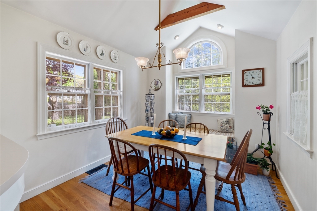 4 Longfellow Road Lexington, MA 02420 - Photo 6 of 37 a dining room with furniture a rug and a chandelier