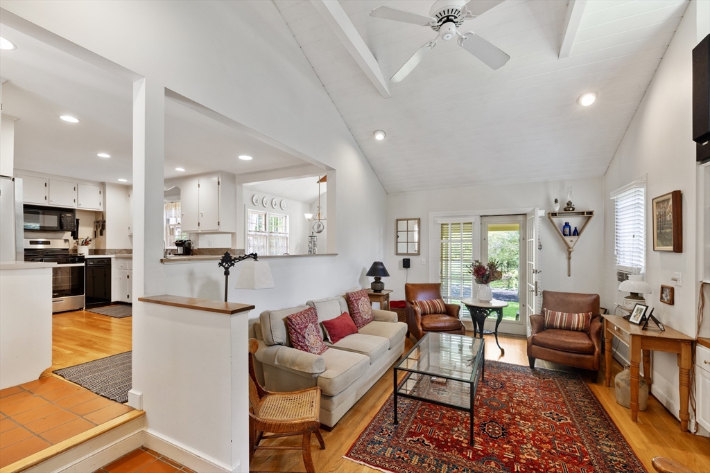 4 Longfellow Road Lexington, MA 02420 - Photo 10 of 37 a living room with furniture kitchen view and a wooden floor