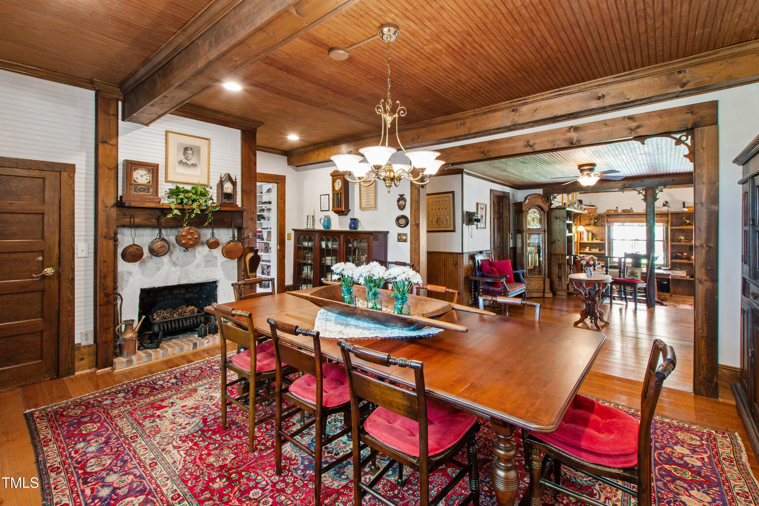 2451 Brick Mill Road Erwin, NC 28339 - Photo 11 of 101 a view of a dining room with furniture and a chandelier