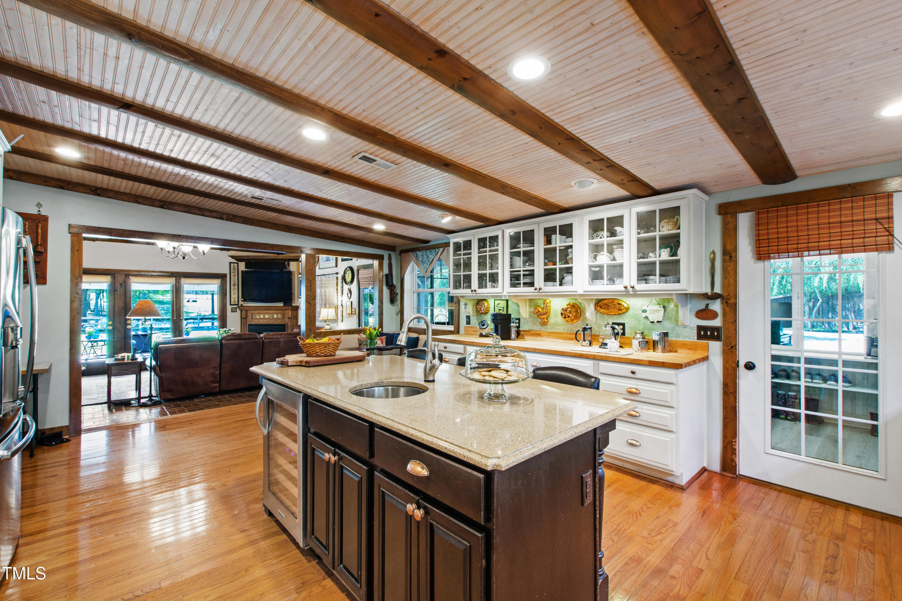 2451 Brick Mill Road Erwin, NC 28339 - Photo 16 of 101 a kitchen with a sink stove and wooden cabinets