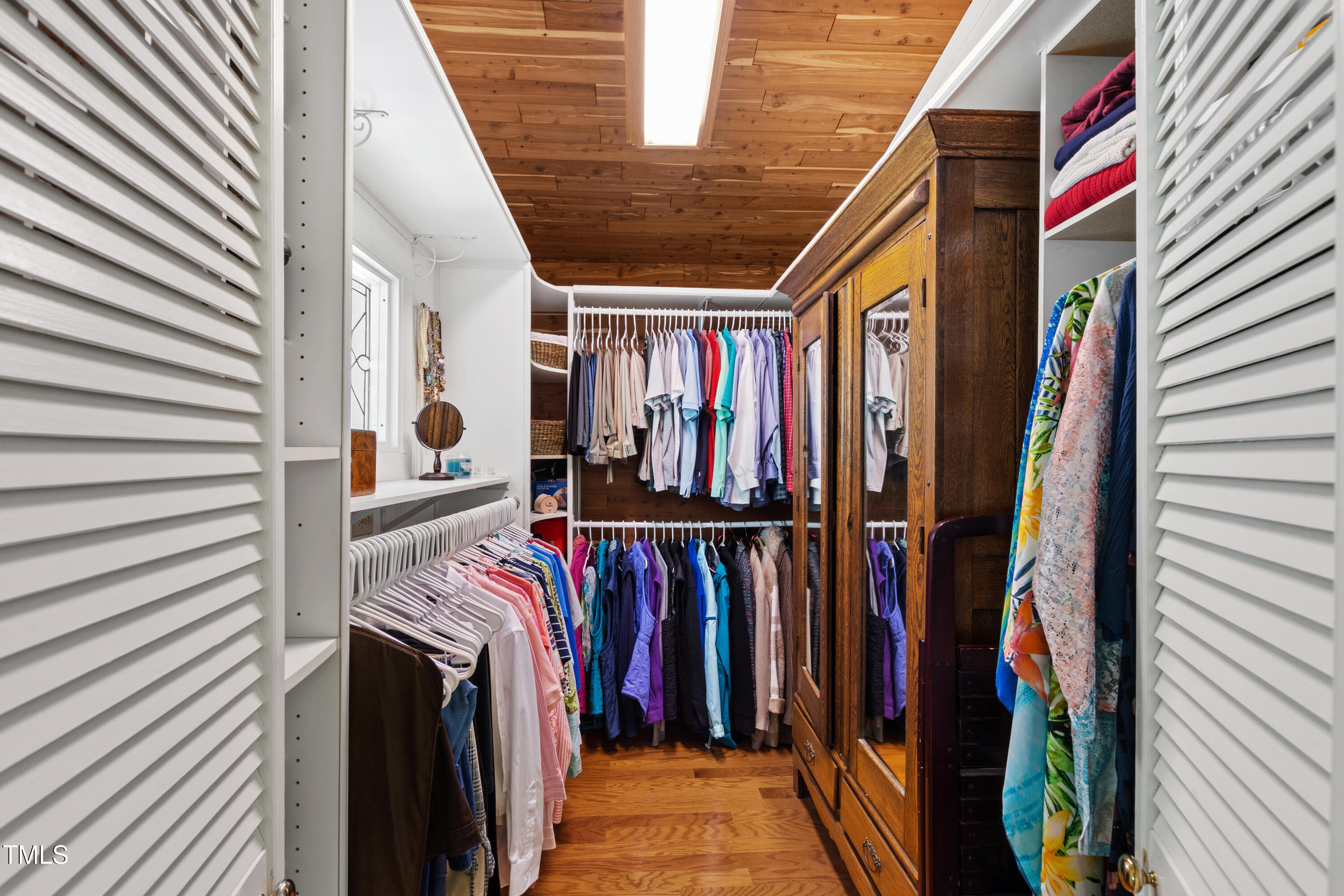 2451 Brick Mill Road Erwin, NC 28339 - Photo 24 of 101 a view of walk in closet with clothes and shoes