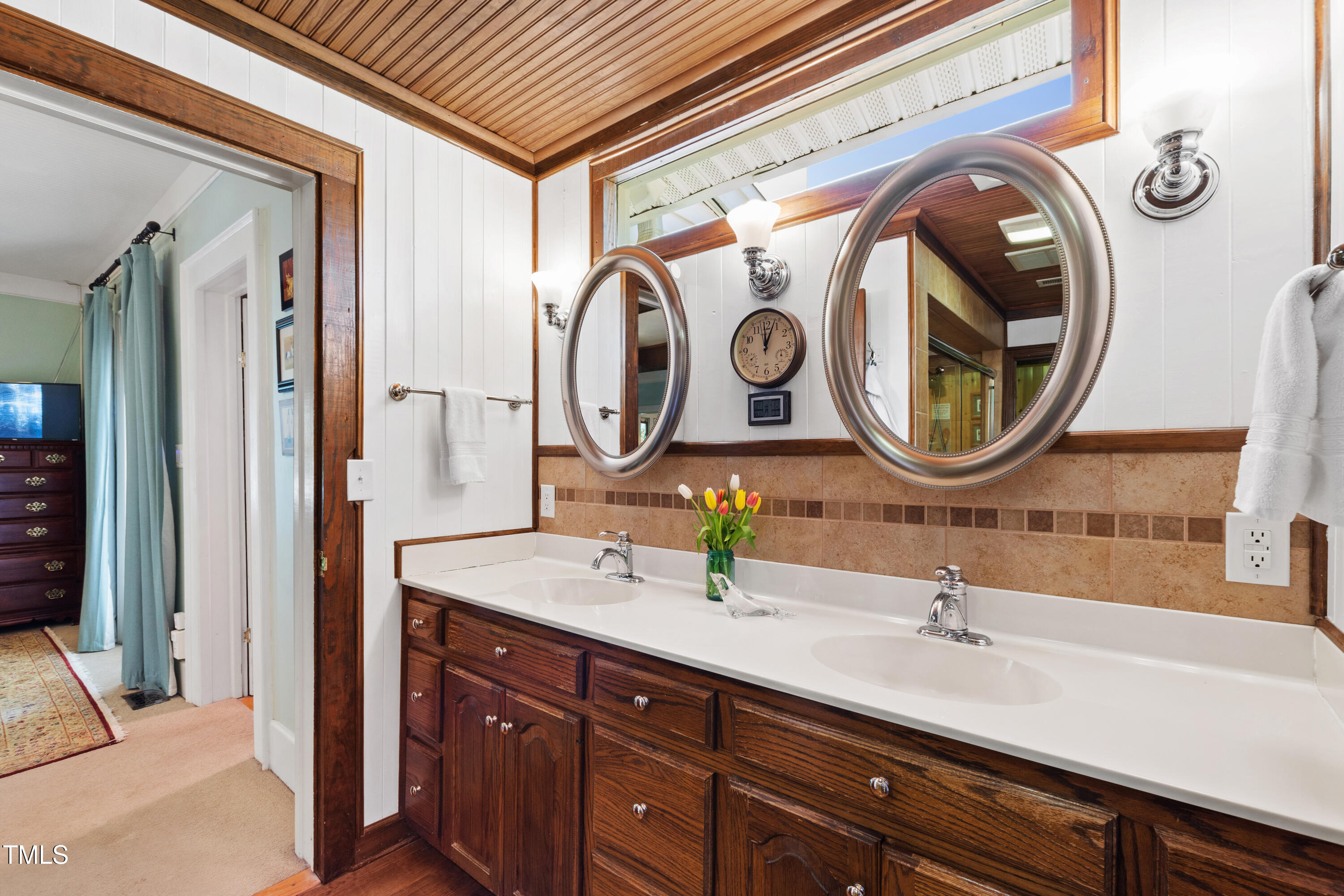 2451 Brick Mill Road Erwin, NC 28339 - Photo 25 of 101 a bathroom with a sink and a mirror