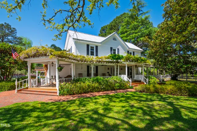 a living room filled with furniture and a table