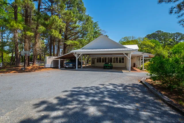 an aerial view of a swimming pool patio swimming pool and outdoor seating