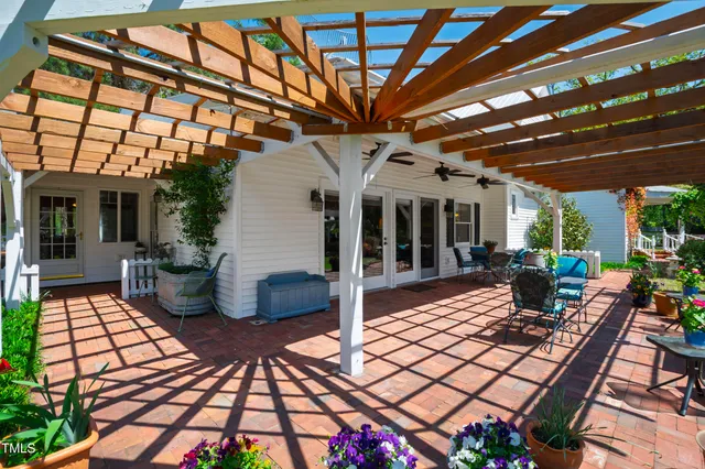 a view of a park with swings and a small yard