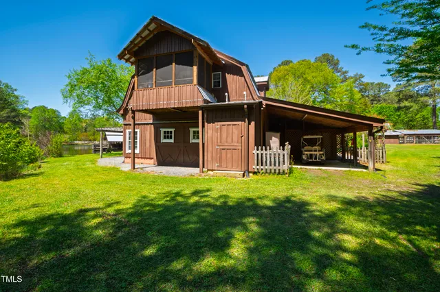 a view of a building with a door and a potted plant