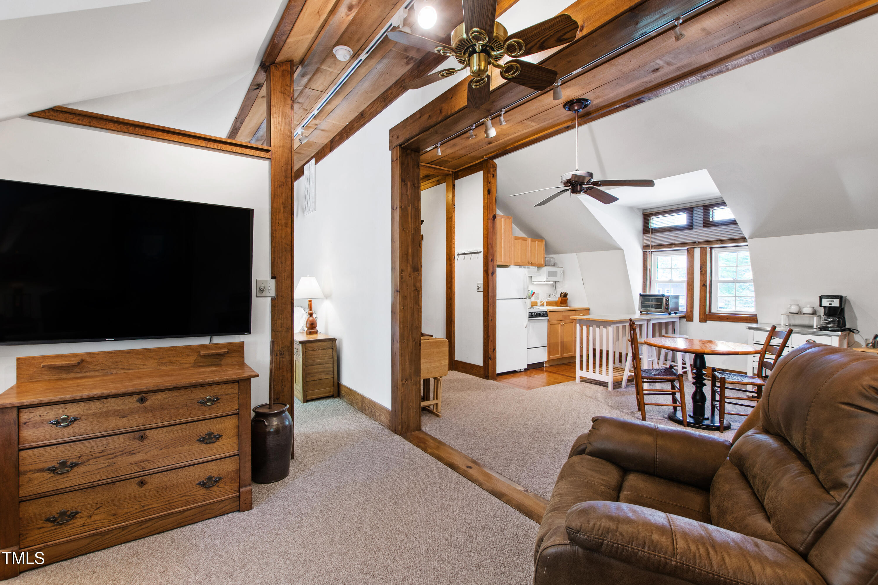 2451 Brick Mill Road Erwin, NC 28339 - Photo 62 of 101 a living room with furniture and a flat screen tv