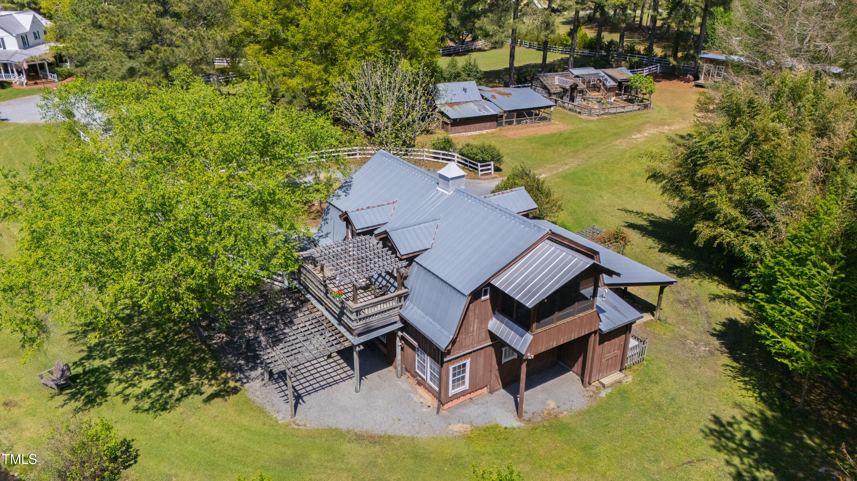 2451 Brick Mill Road Erwin, NC 28339 - Photo 65 of 101 an aerial view of a swimming pool patio swimming pool and outdoor seating