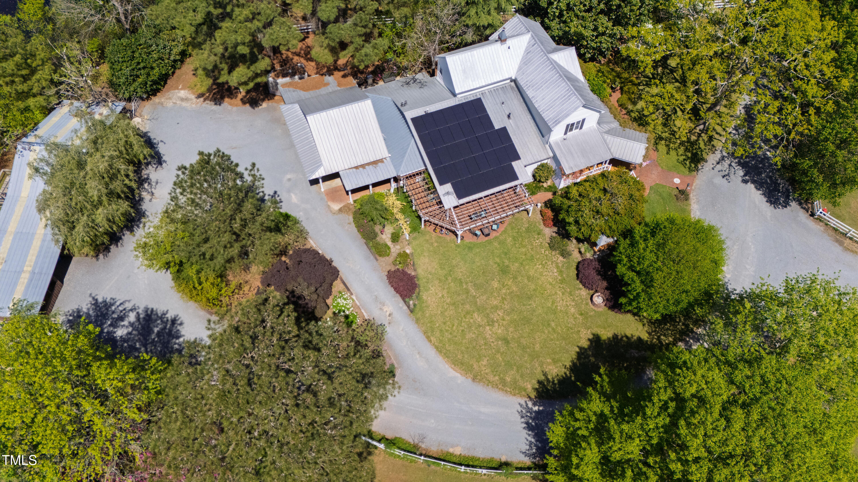 2451 Brick Mill Road Erwin, NC 28339 - Photo 93 of 101 an aerial view of a house with a yard and trees all around