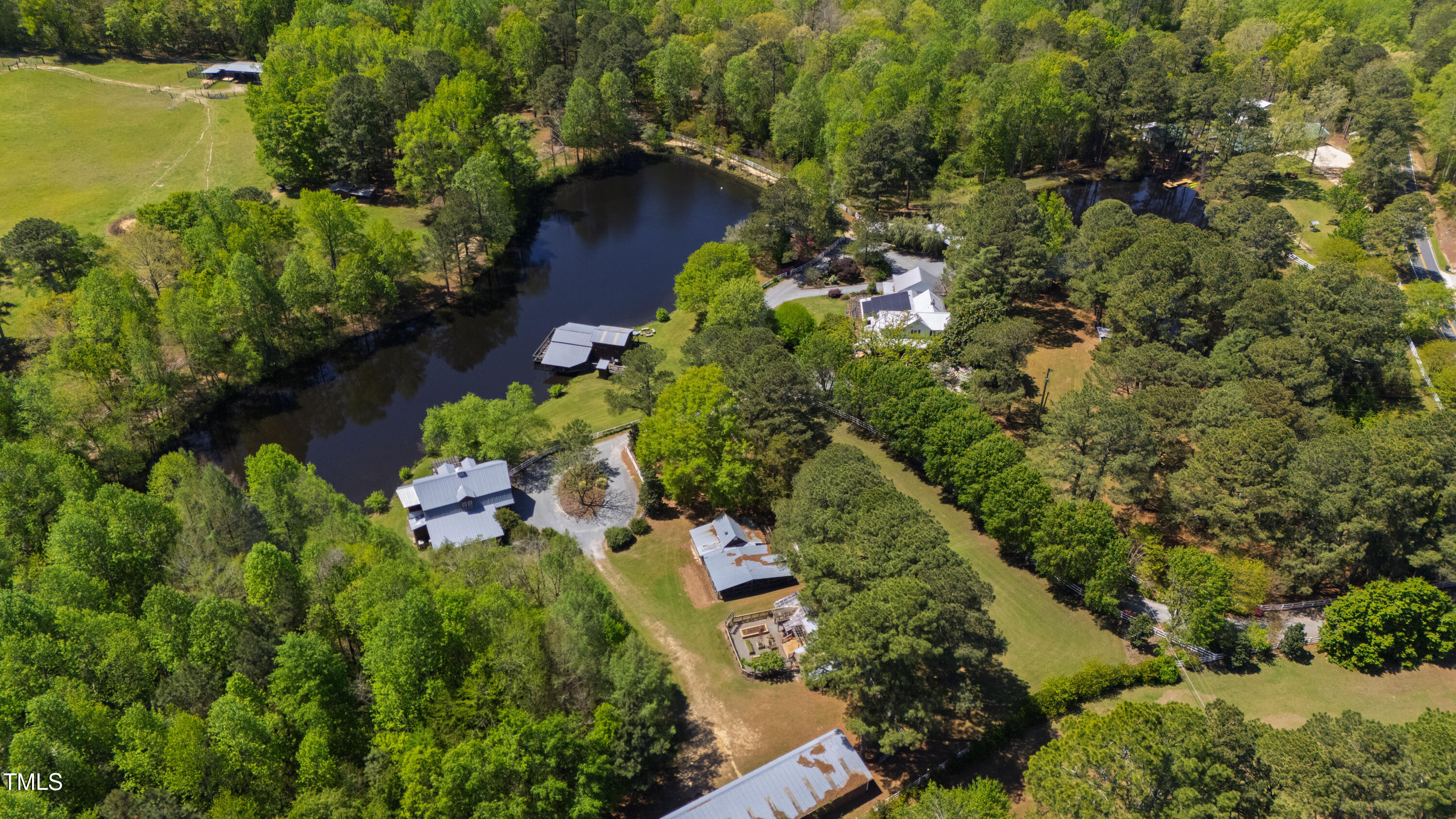 2451 Brick Mill Road Erwin, NC 28339 - Photo 94 of 101 a view of a garden with lawn chairs