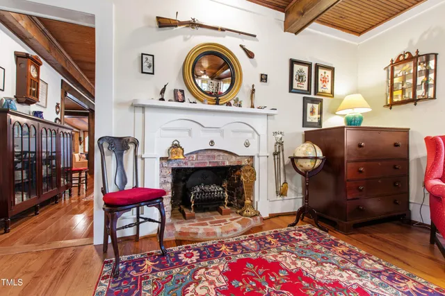a kitchen with a sink stove and wooden cabinets