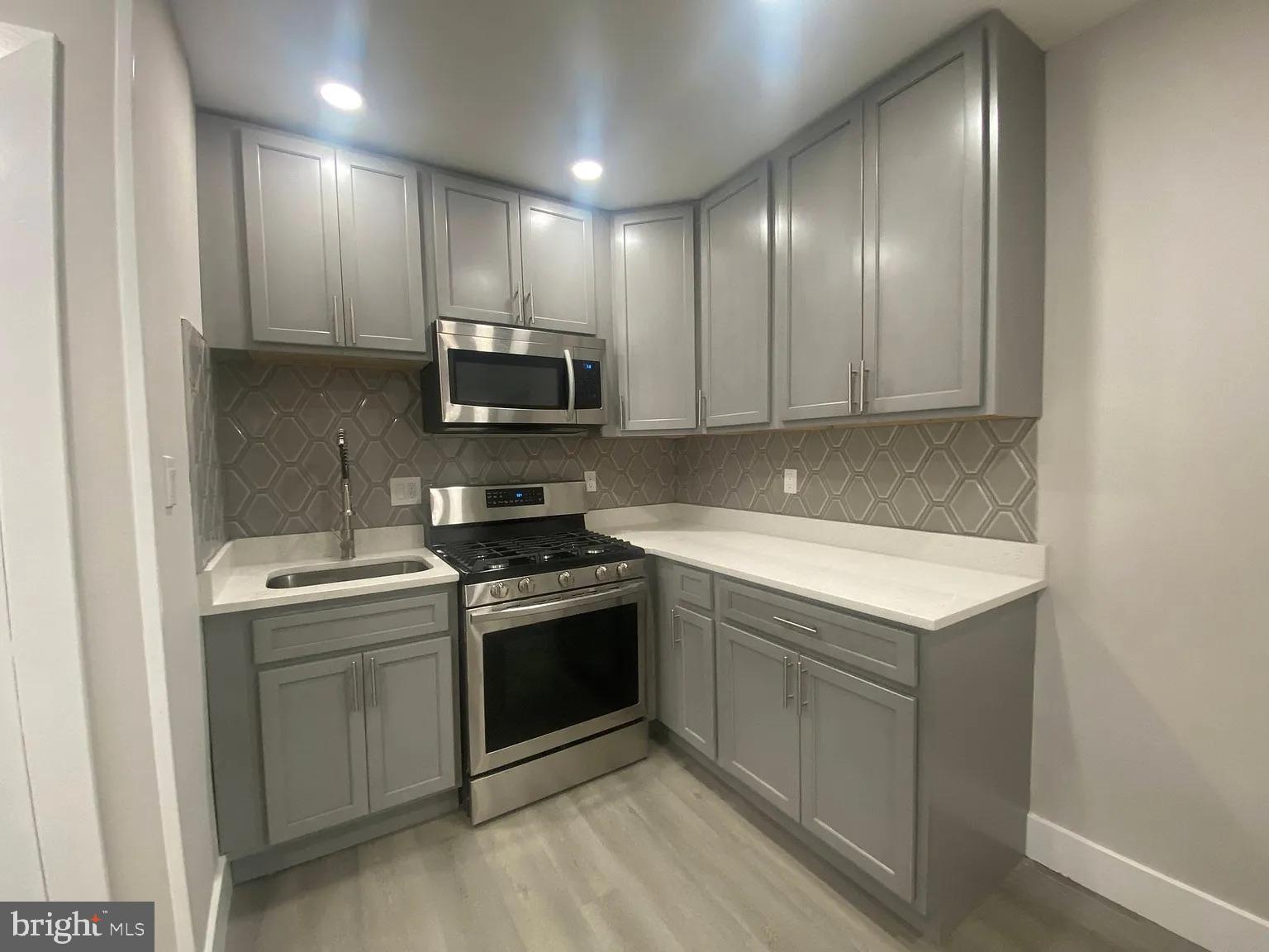940 5th Street Laurel, MD 20707 - Photo 1 of 10 Sleek modern kitchen with stylish finishes.