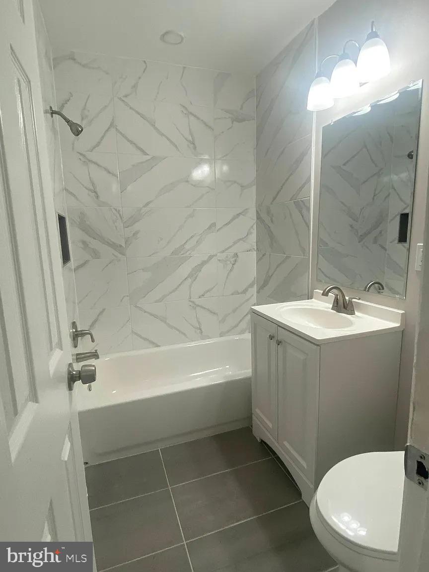 940 5th Street Laurel, MD 20707 - Photo 6 of 10 Modern bathroom with elegant finishes.