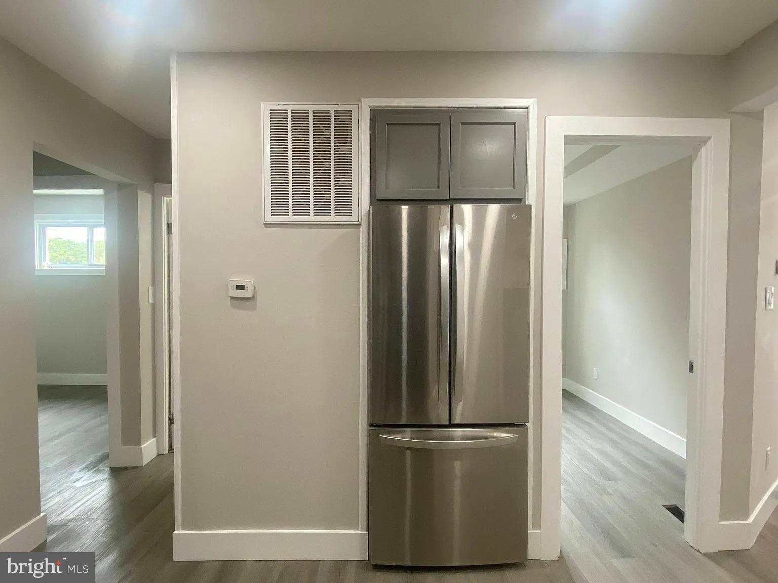 940 5th Street Laurel, MD 20707 - Photo 7 of 10 Modern kitchen with sleek stainless steel fridge.