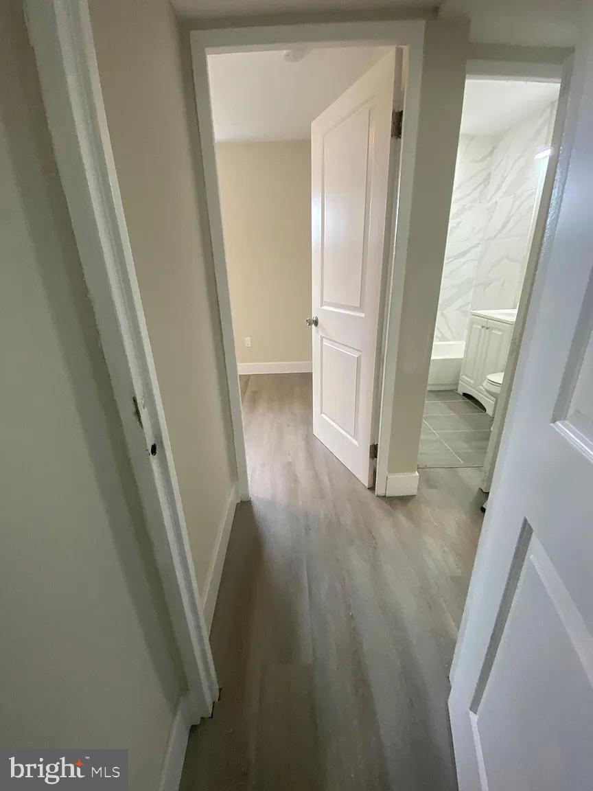 940 5th Street Laurel, MD 20707 - Photo 9 of 10 Inviting hallway leading to serene spaces.