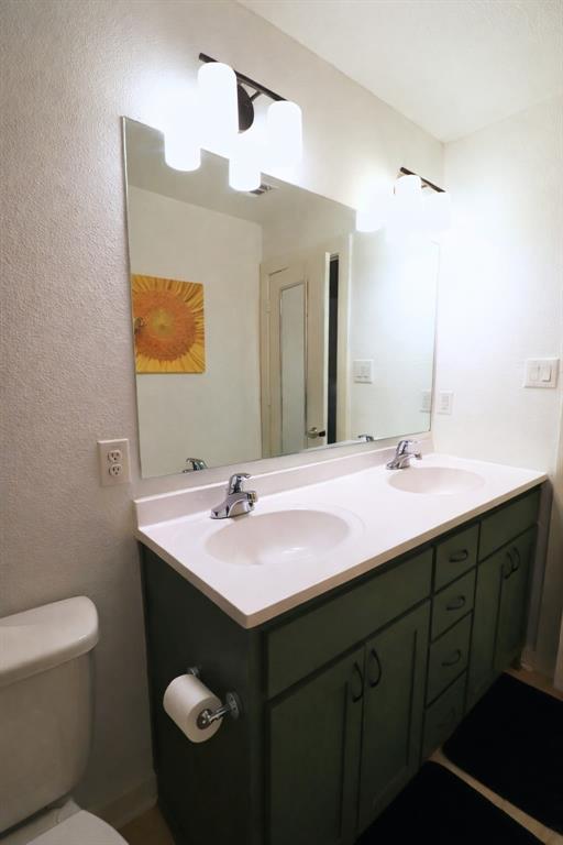 309 Thomas Street Terrell, TX 75160 - Photo 16 of 17 a bathroom with a sink and a mirror