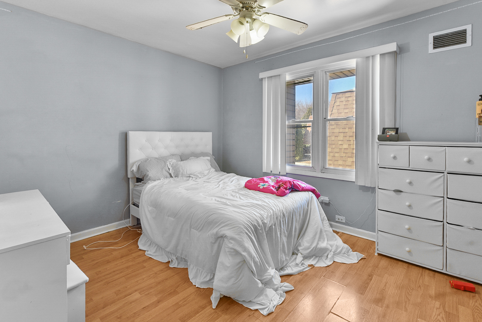 12746 South Kenneth Avenue, Unit 2F Alsip, IL 60803 - Photo 12 of 14 a bedroom with a bed and a window
