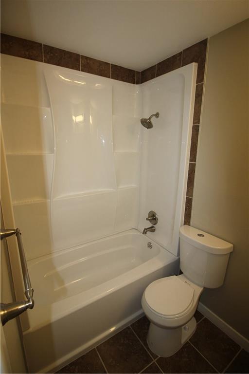 3532 Antilles Drive Mesquite, TX 75150 - Photo 13 of 18 a bathroom with a toilet and a shower